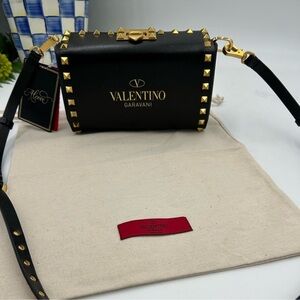 Women’s Valentino Garavani rock, stud, leather shoulder bag made in Italy